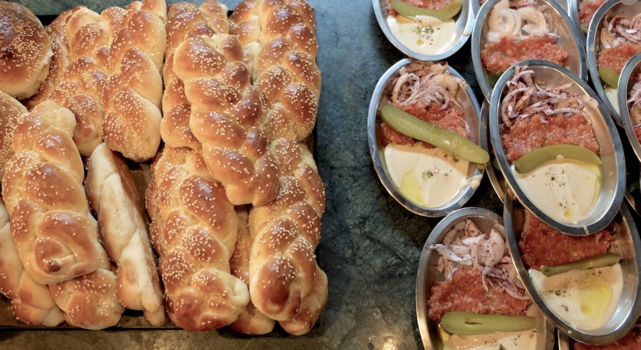 Traditional Deli and Café — Fresh Challah and Kosher Appetizers — For Illustration Only